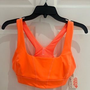Free People Movement bright orange sports bra